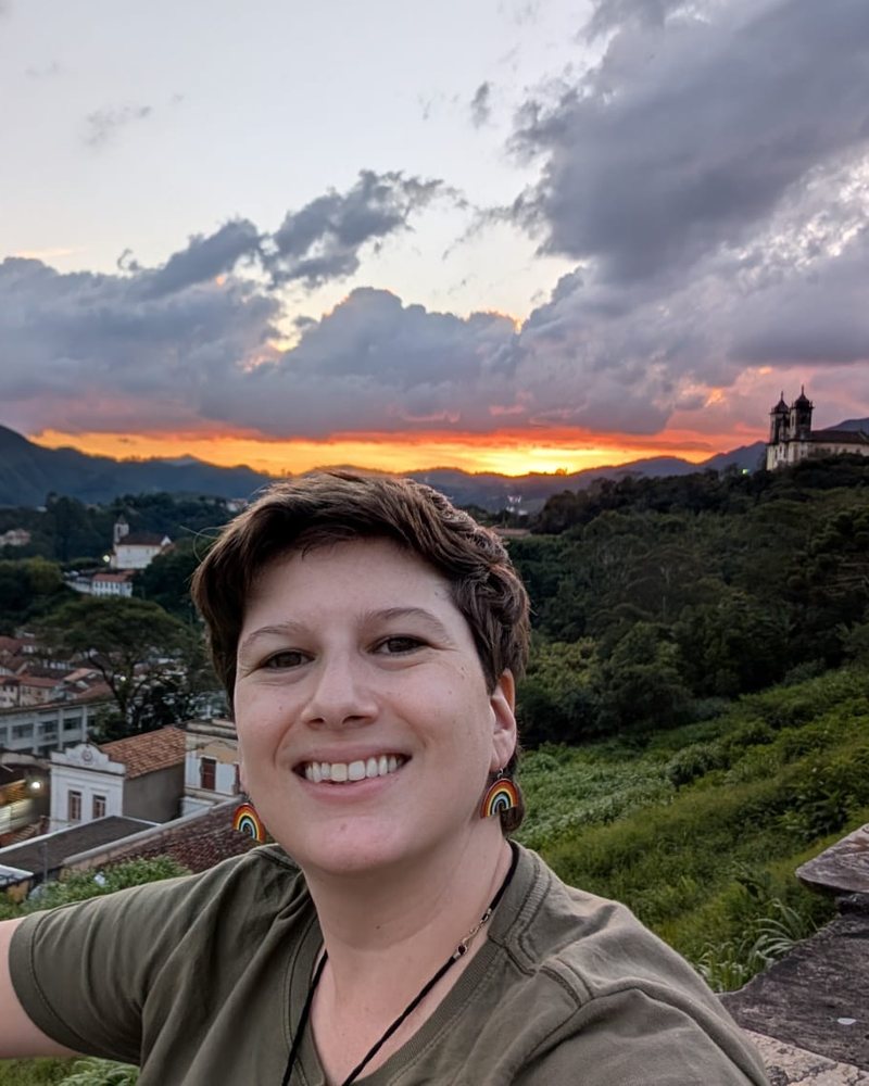 Portrait of Nicole Wolovitz, workflow and project management consultant, smiling at sunset